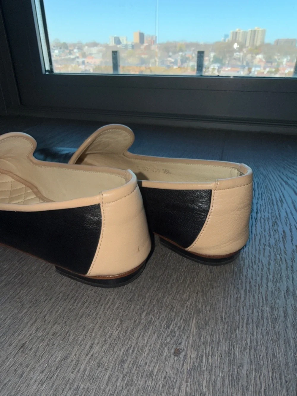 CHANEL Black Leather Slip-On Loafers with Cream Trim and Gold CC - Picture 6 of 9